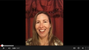 Smiling woman in a video thumbnail.