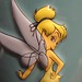 Fairy with blonde hair and wings.