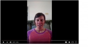 Person in a video call, indoors.