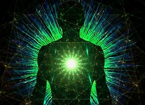 Silhouette with radiant green energy aura.